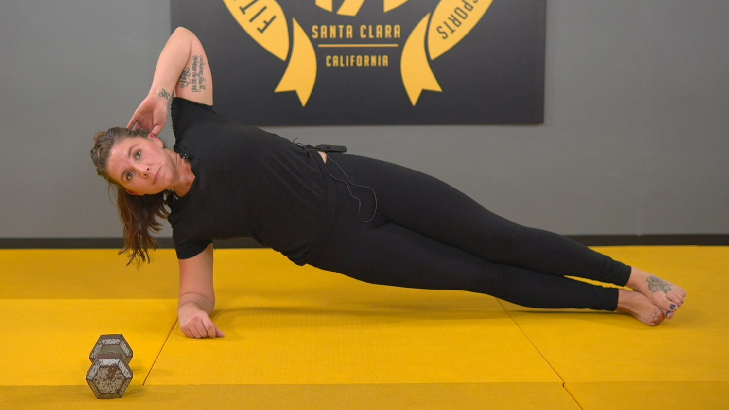 Young Woman Doing a Side Plank