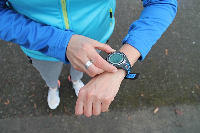female jogger checking watch