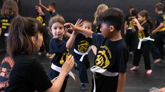 kids sparring in martial arts class